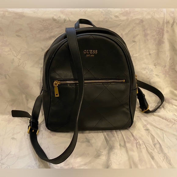 Classic and beautiful Guess backpack-style purse. - Picture 1 of 4